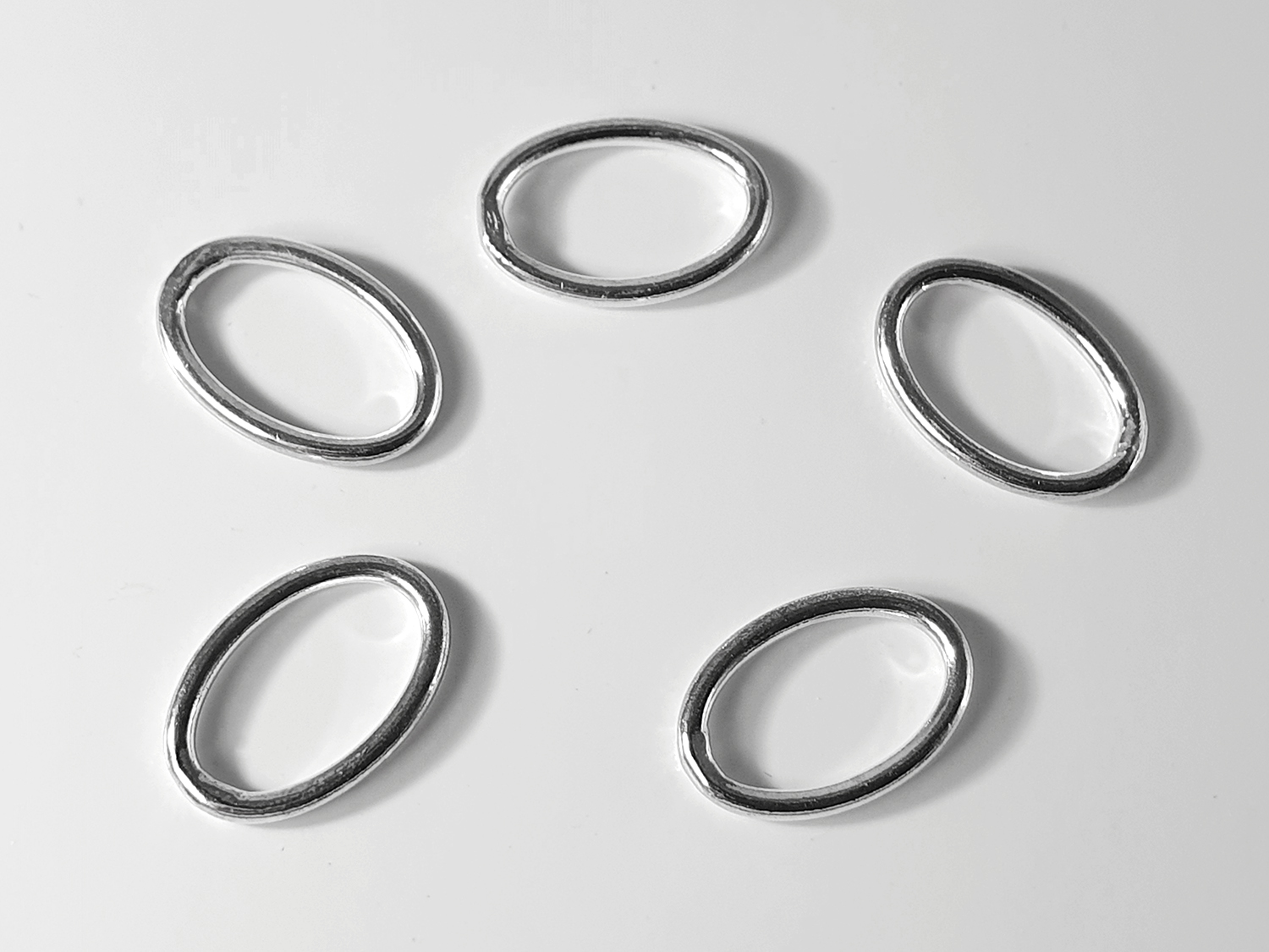 Oval counter ring slightly wavy approx. 12x8mm 5pcs/pkg Price/pkg 925-silver - 2