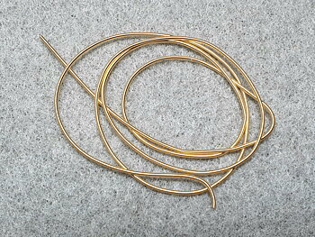 Frenchwire 0,6mm goldplatedTräns 0,6 mm guldfärgad ca. 40cm/ fp Pris/ fp