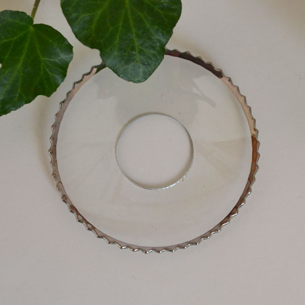 Ljusmanschett i glas med uddkant i silver