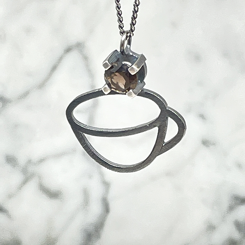 Silver necklace, mug with smoky quartz