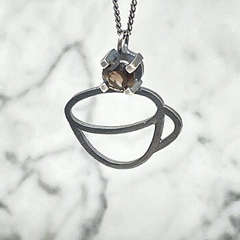 Silver necklace, mug with smoky quartz