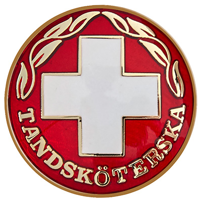 Vårdbrosch 83. TANDSKÖTERSKA BROSCH