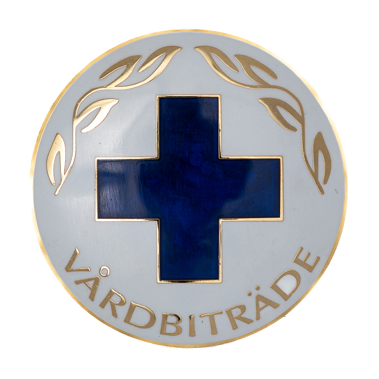Vårdbrosch vårdbiträde 58