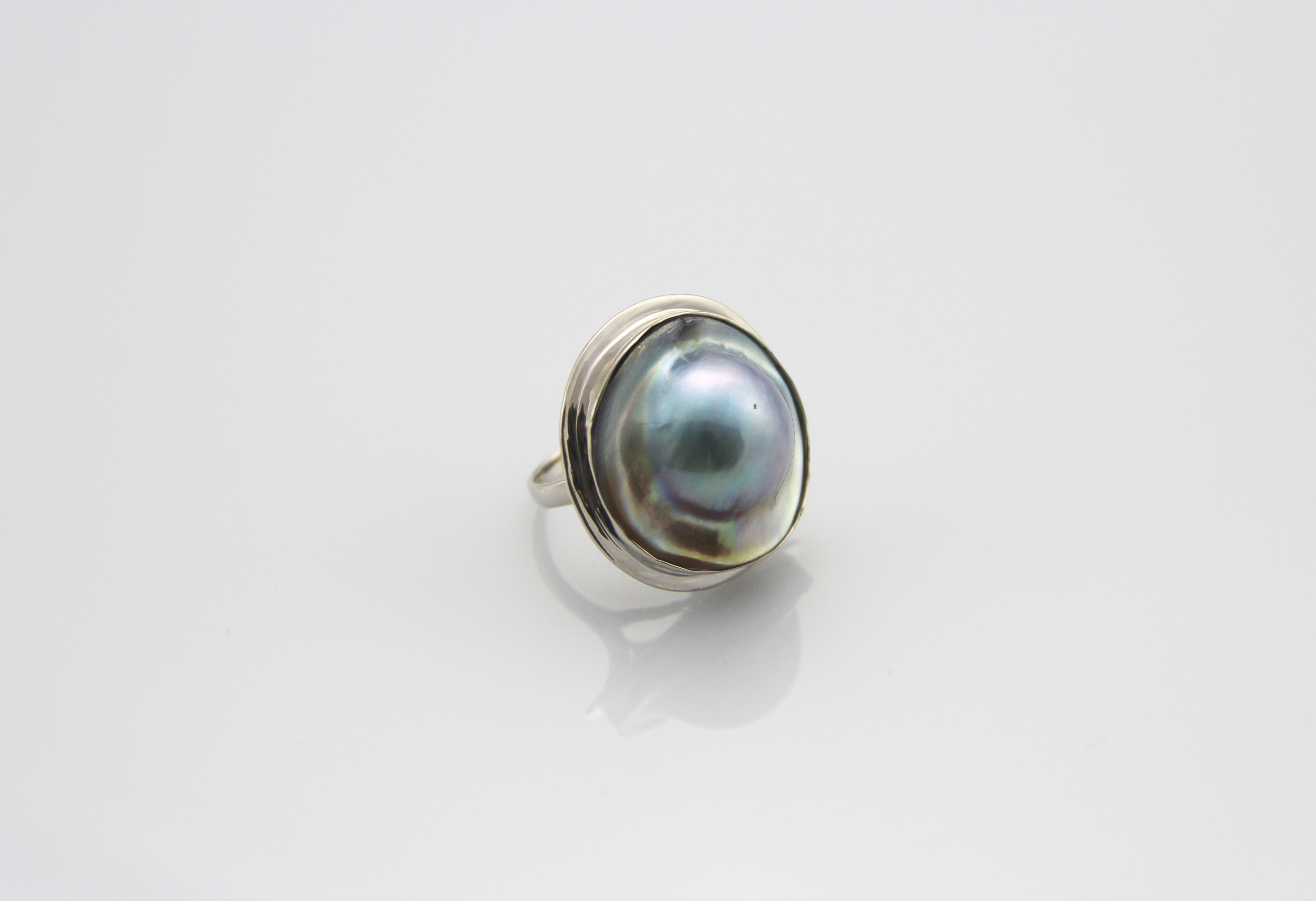 Perlenring-Mabe in Silber