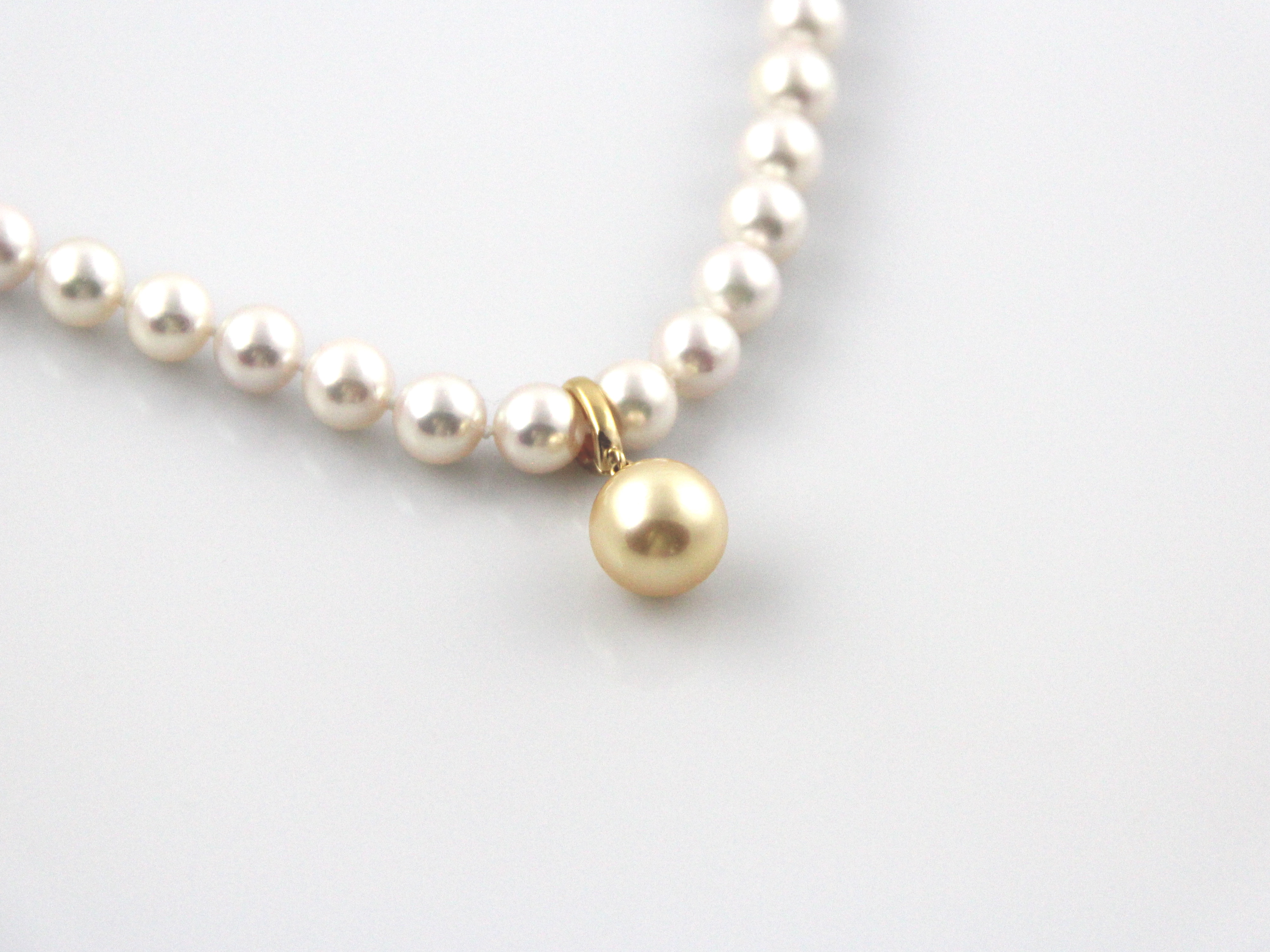 Cultured pearl store pendant