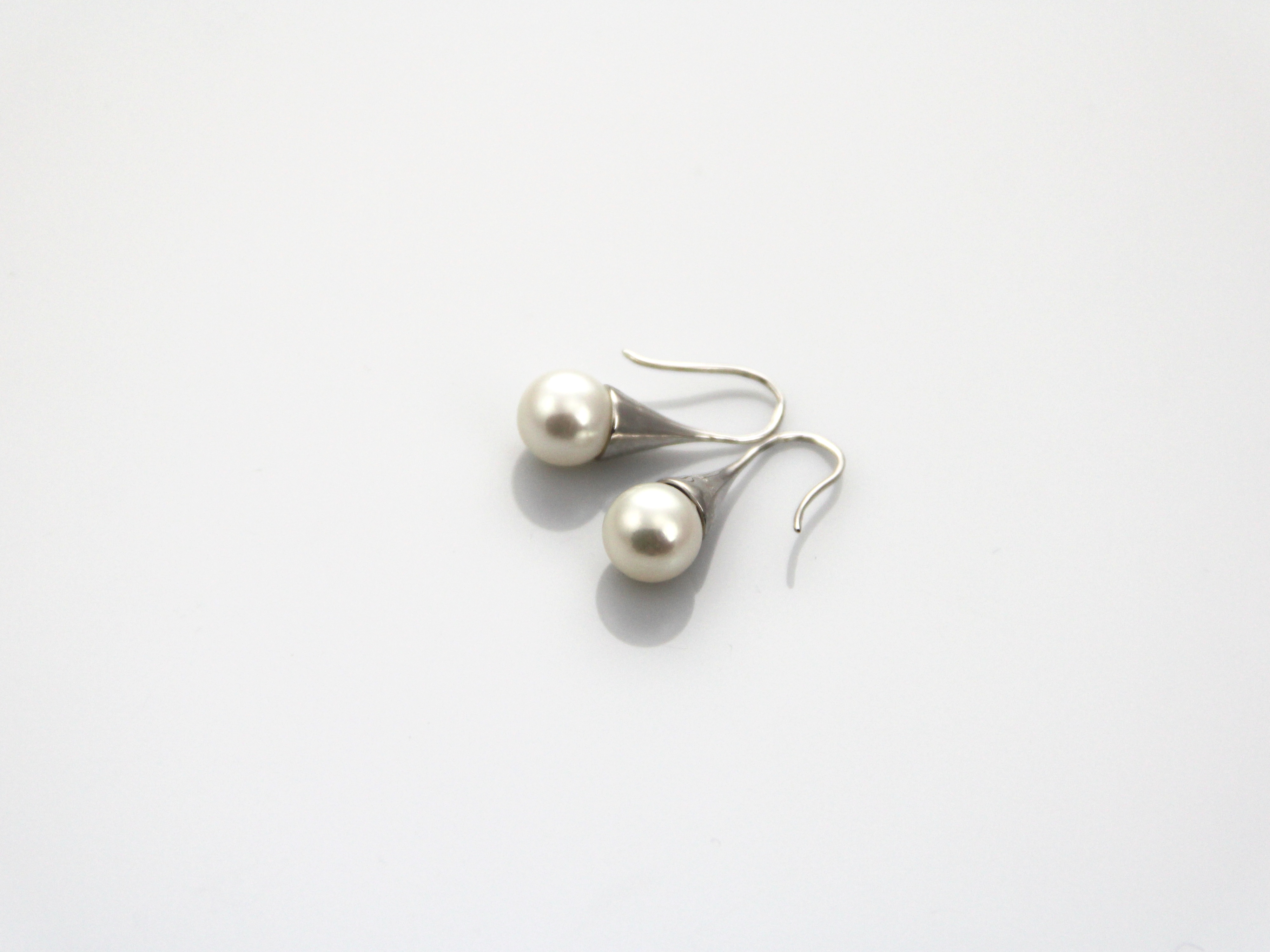 Fresh water pearl earrings set in Silver
