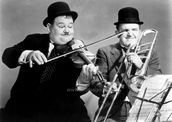 Laurel and Hardy playing the violin and trombone, Greeting Card