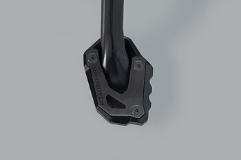 Extension for side stand foot.