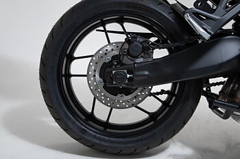 Slider set for rear axle