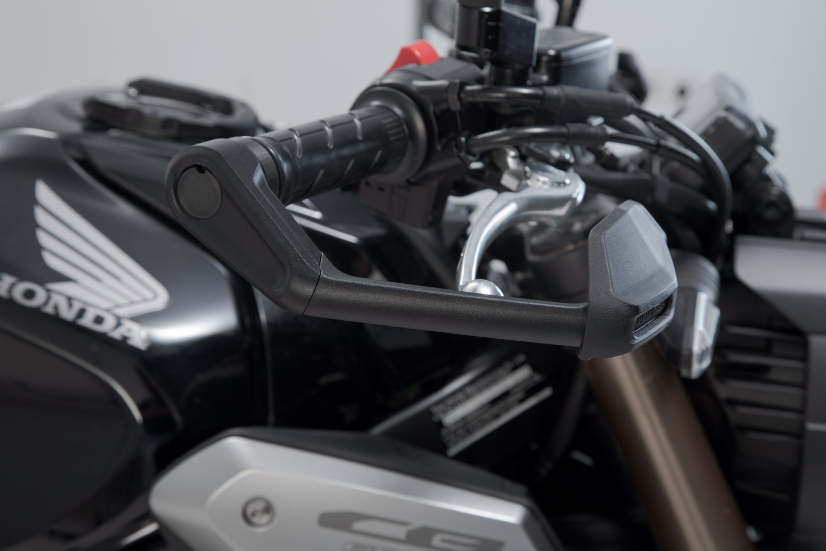 Lever guards with wind protection - 4
