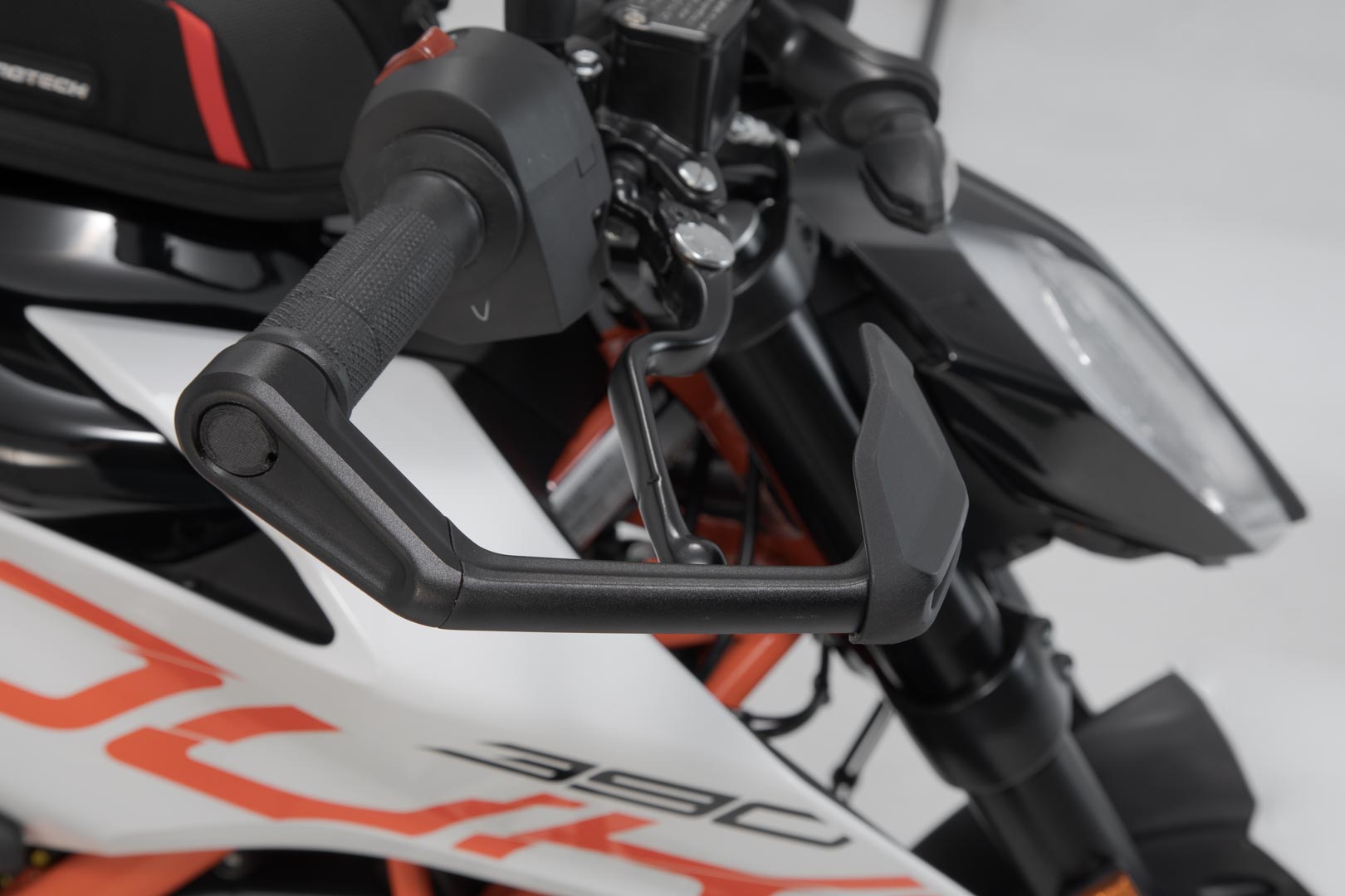 Lever guards with wind protection - 5
