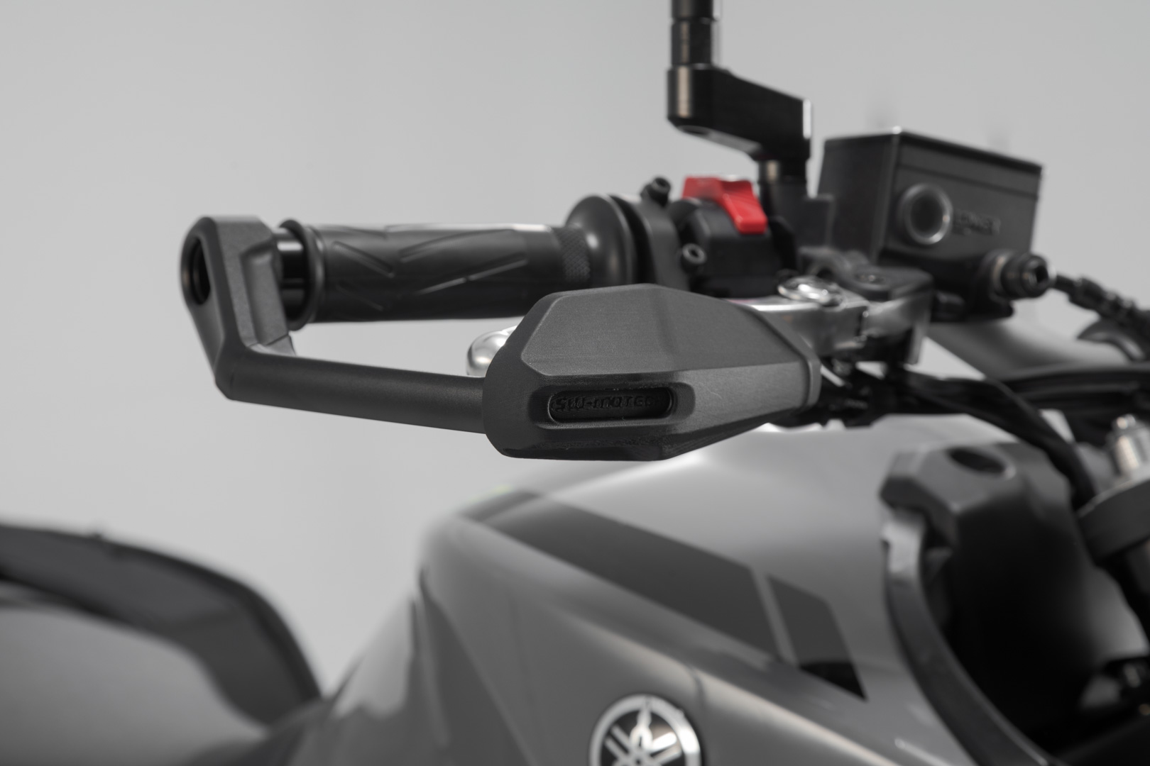 Lever guards with wind protection - 3