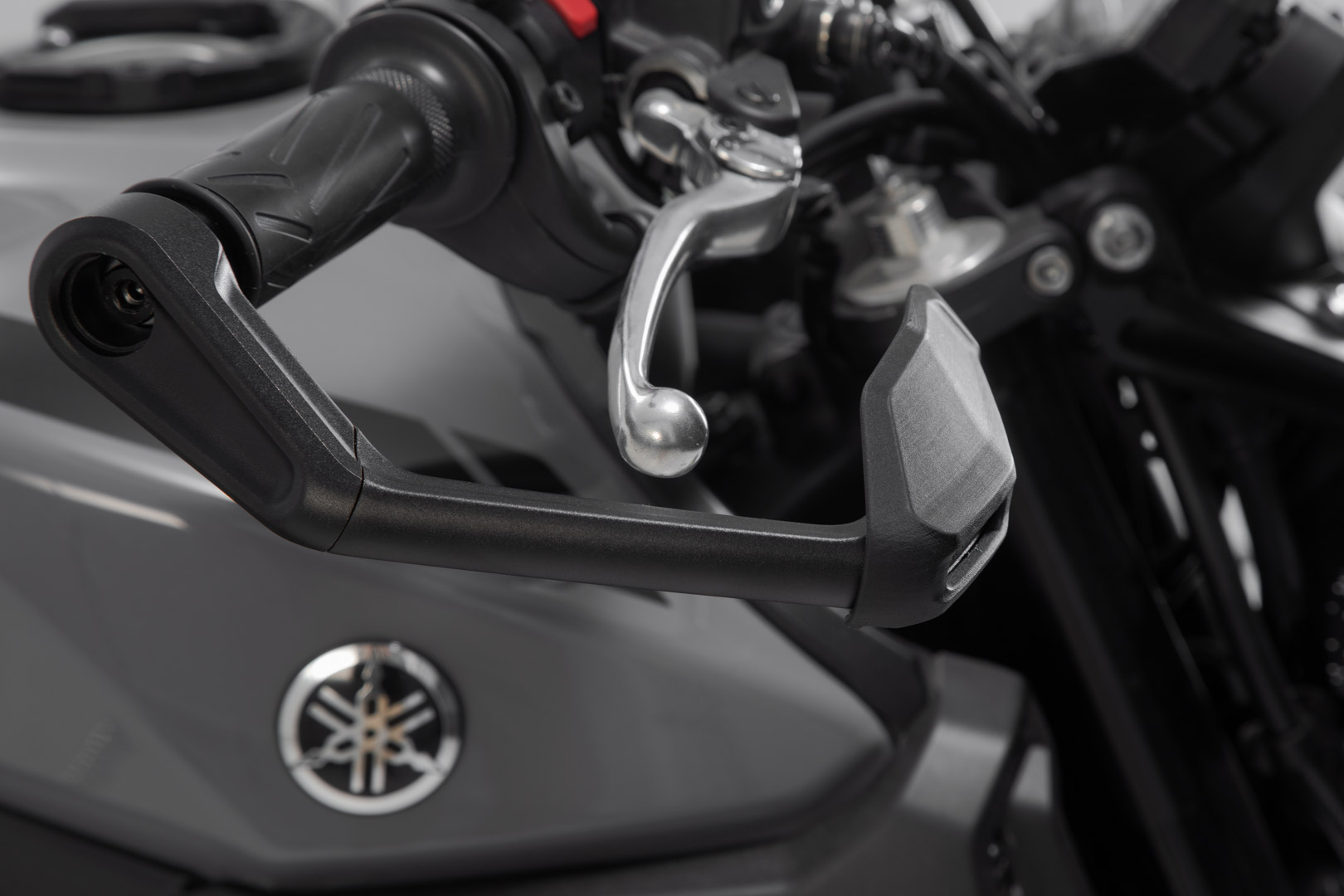 Lever guards with wind protection - 5