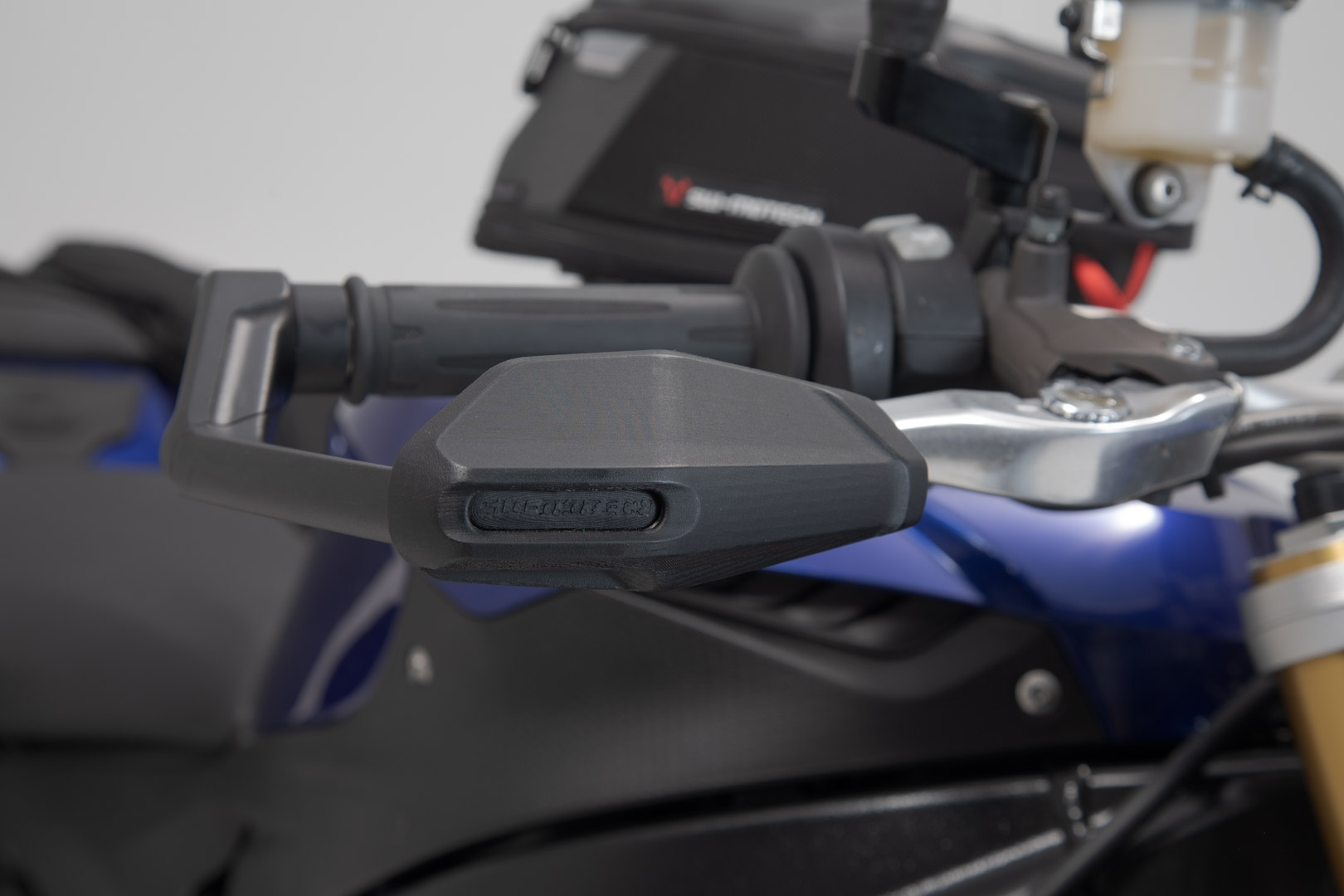 Lever guards with wind protection - 3