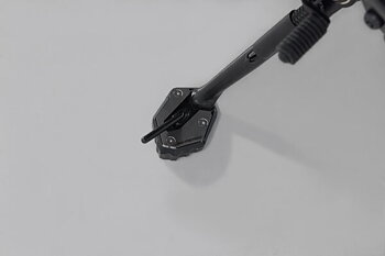 Extension for side stand foot. 