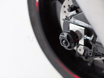 Slider set for rear axle