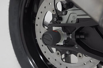 Slider set for rear axle