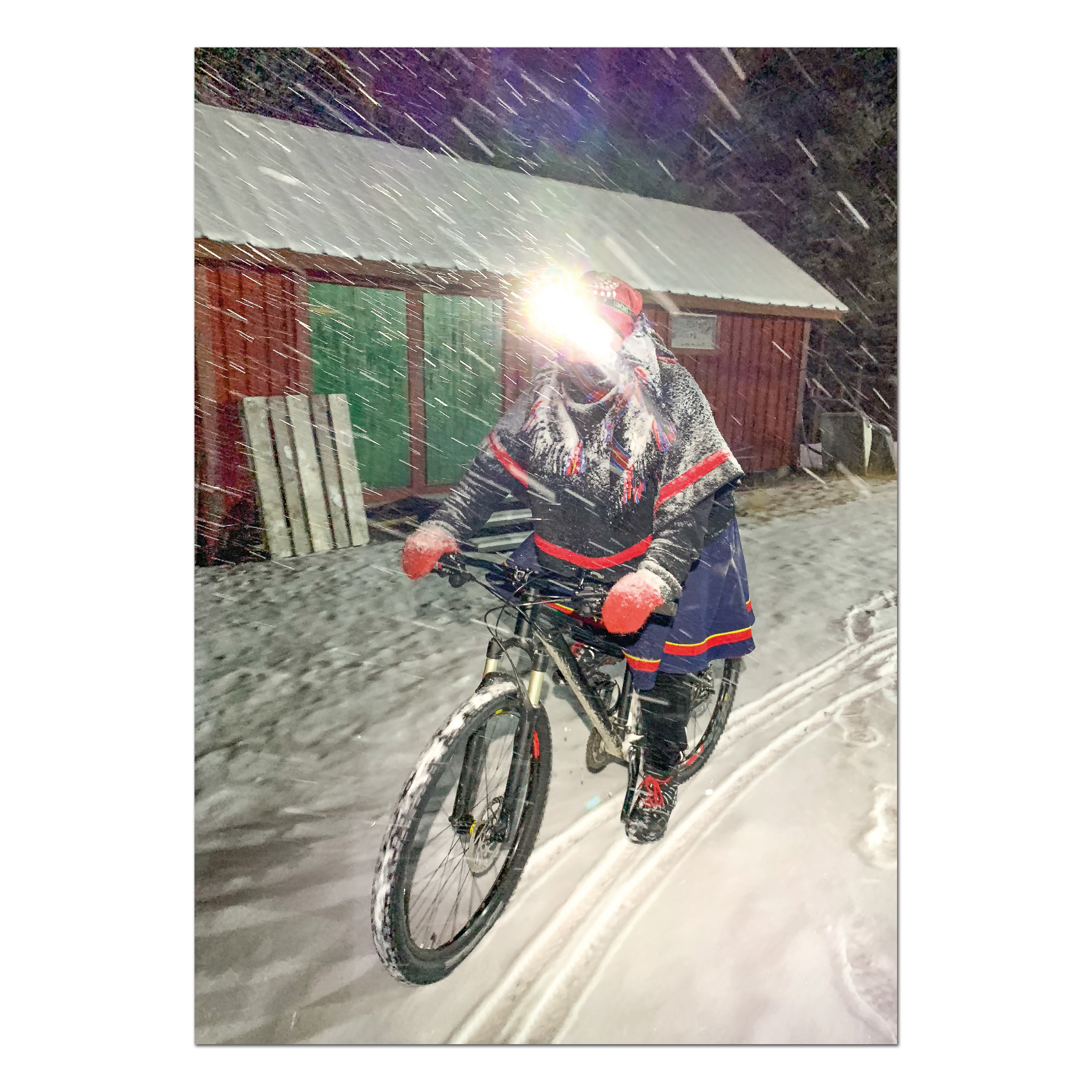Postkarte Idja Lotta biking in snowstorm