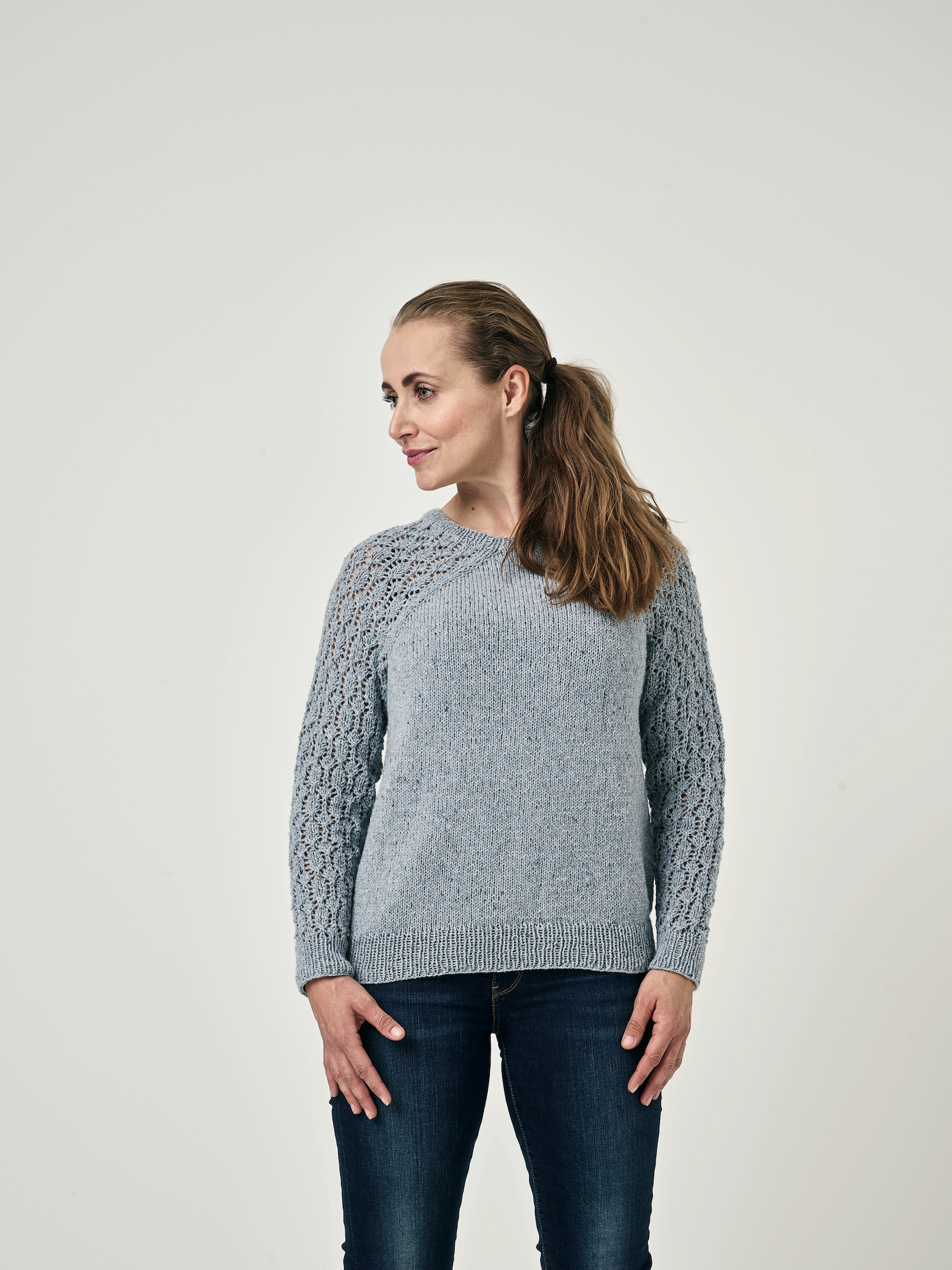 Sweater med mönstrade ärmar