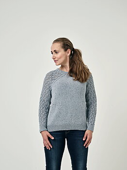 Sweater med mönstrade ärmar