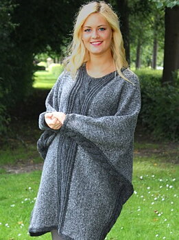 Poncho med flätor