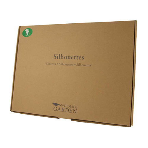 Silhouette chiot noir dans son emballage carton