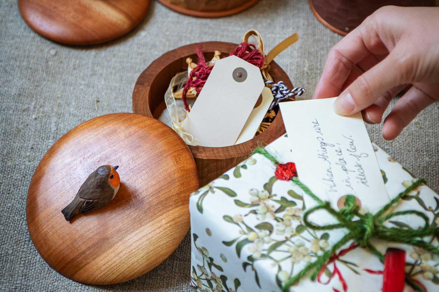 Wildlife Garden wooden box with robin styled in a Christmas-inspired setting