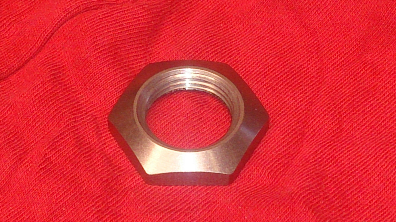 Engine Shaft Nut LH Excelsior. OEM part no: XG1692