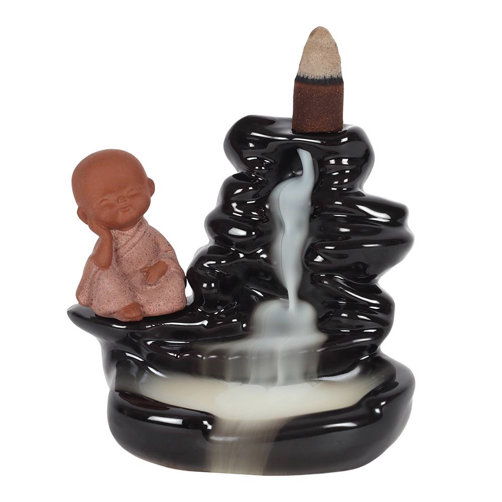 backflow rödelse brännare vattenfall med buddha 