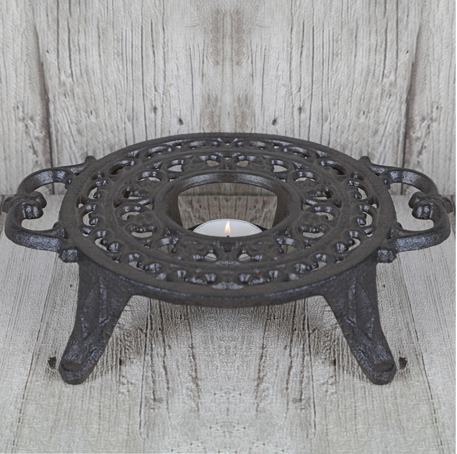 Cast iron trivet heater on foot shabby chic country style French country style