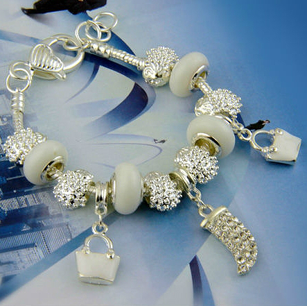 Armband silver pärlor berlock