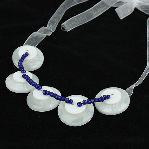 Halsband av knappar - 4