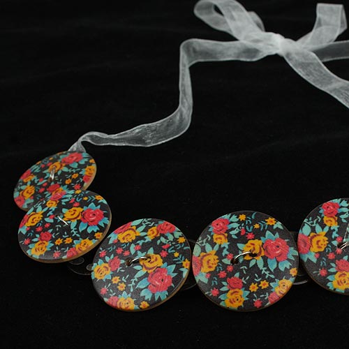 Halsband av knappar - 3