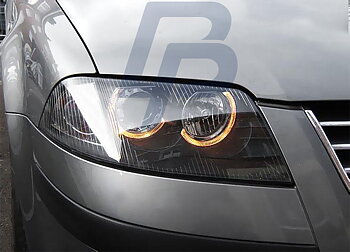 STRÅLKASTARE VW PASSAT 3BG B5 FL 09.00-03.05 ANGEL EYES SVARTA
