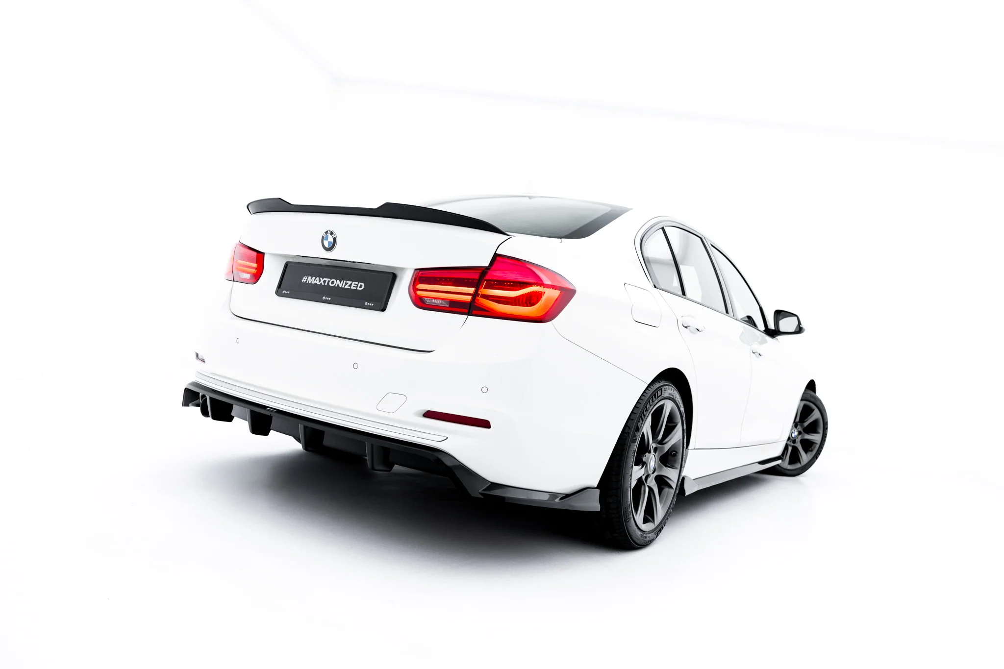 REAR SPLITTER (WITH VERTICAL BARS) SUITABLE FOR BMW 3 SPORTLINE SEDAN / TOURING F30 / F31 – MAXTON DESIGN