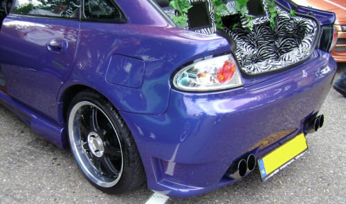 MAZDA 323 FBA 95-98 LXS-BAKLAMPOR KROMADE
