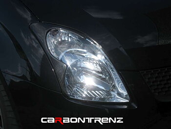 SUZUKI SWIFT 05-09 CARBONTRENZ REAL CARBON HEADLIGHT COVERS