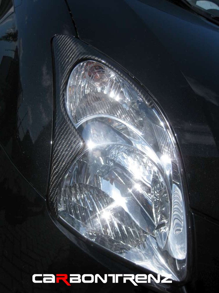 SUZUKI SWIFT 05-09 CARBONTRENZ REAL CARBON HEADLIGHT COVERS - 3