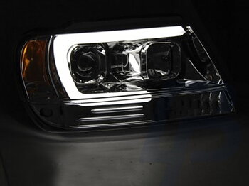 HEADLIGHTS CHRYSLER JEEP GRAND CHEROKEE 99-05.05 TUBE LIGHT CHROME