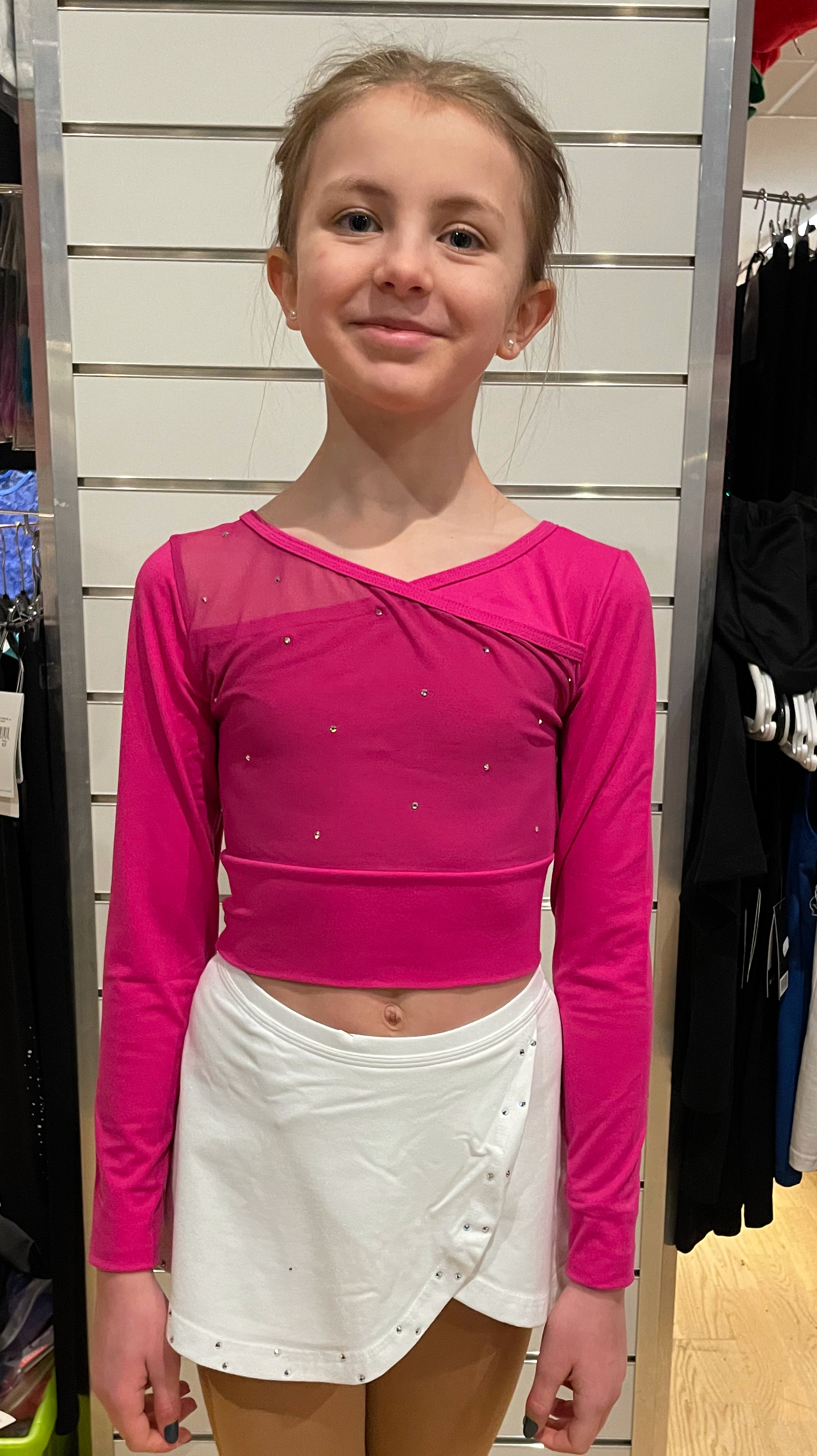 Långärmad rosa croptopp från Bolero med mesh i ryggen och kristaller