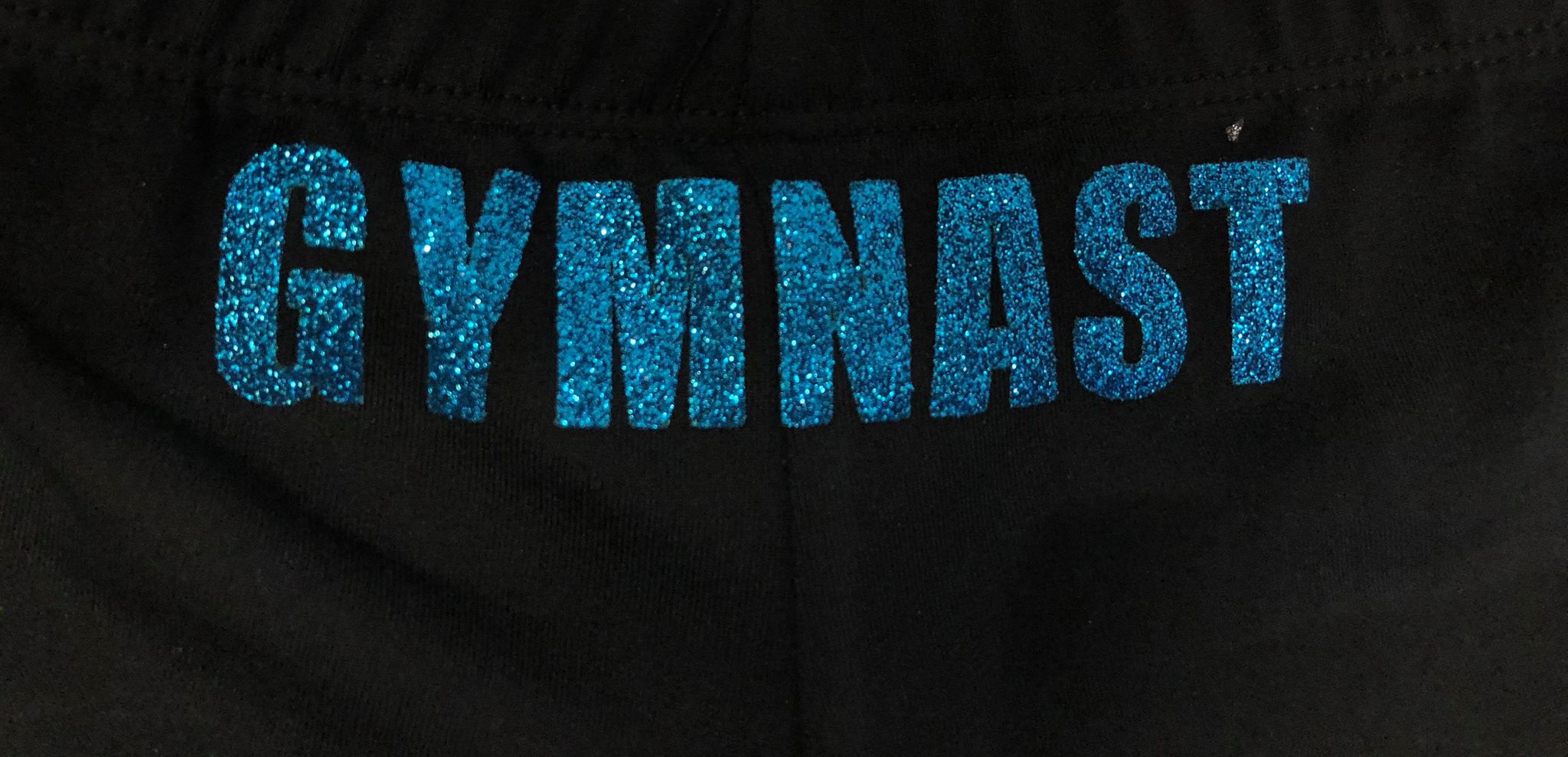 Texten "Gymnast" i glittertryck i olika färger - 8