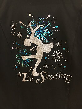 Konståkningstryck med glitter, kristallet och hologram i rosa eller turkos