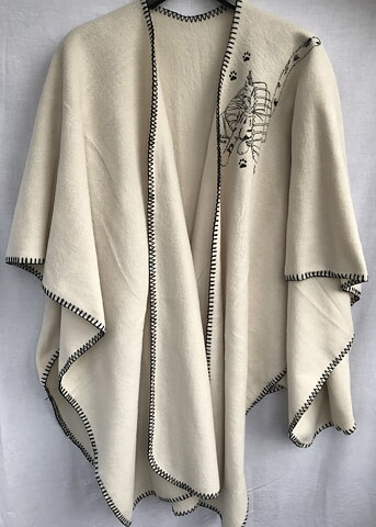 Poncho Tittut Sand