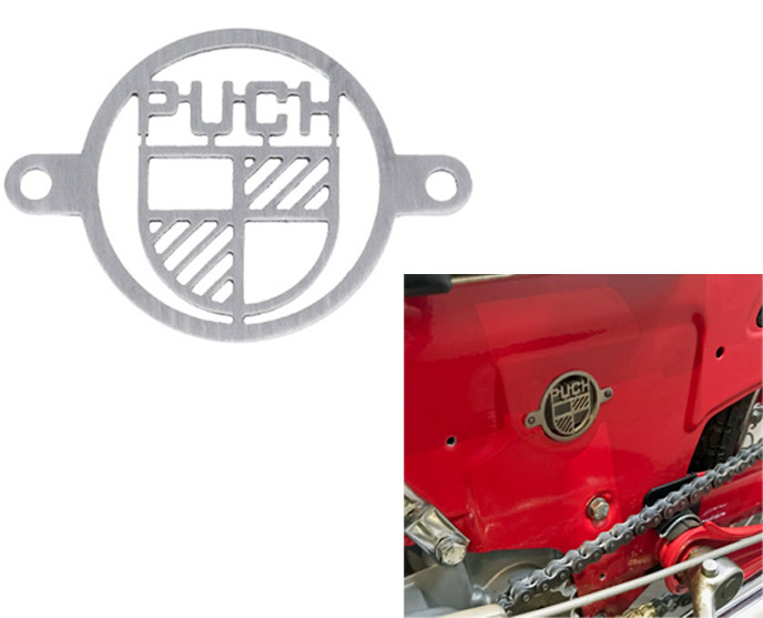 Puch-logolla varustettu ilmansuodattimen reikäkehyksen peitelevy ruostumatonta terästä (52MM leveä kiinnityskohtien välillä) 2 MM paksuinen - 2
