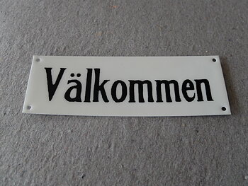 Välkommen/skylt