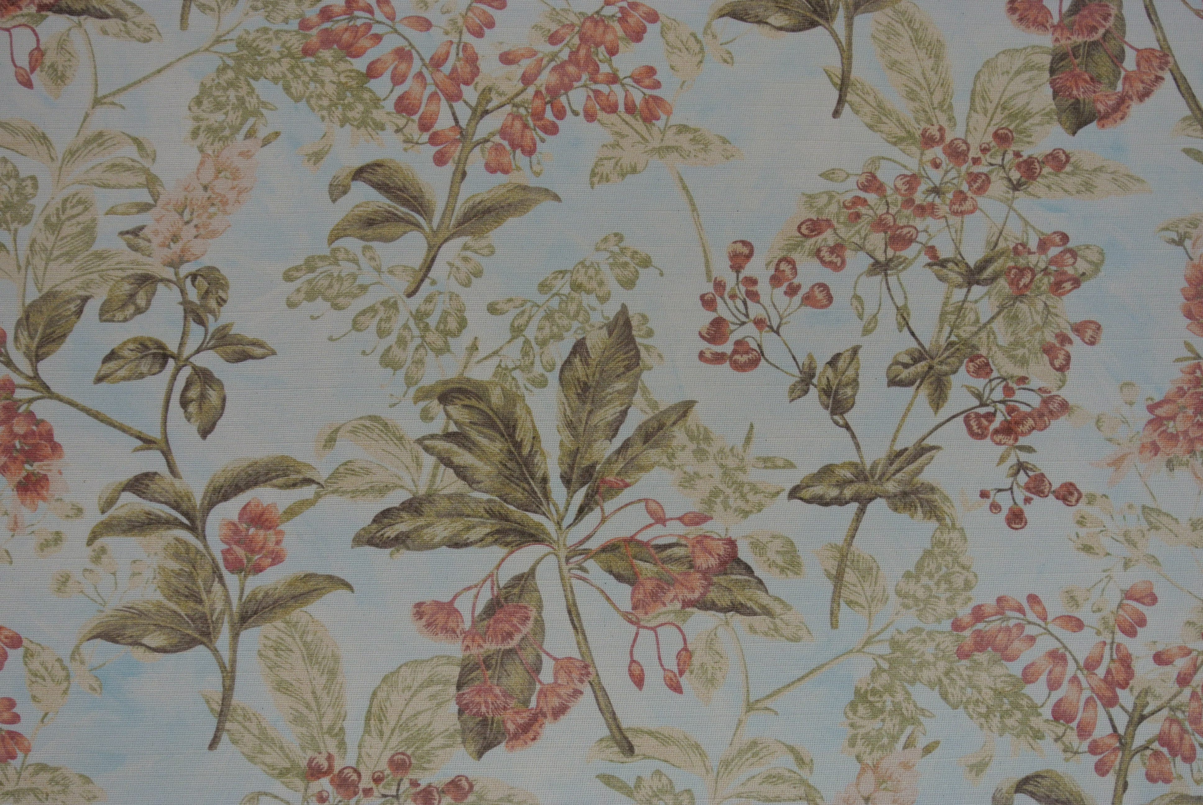 ljus botten med blommor i aprikos toner