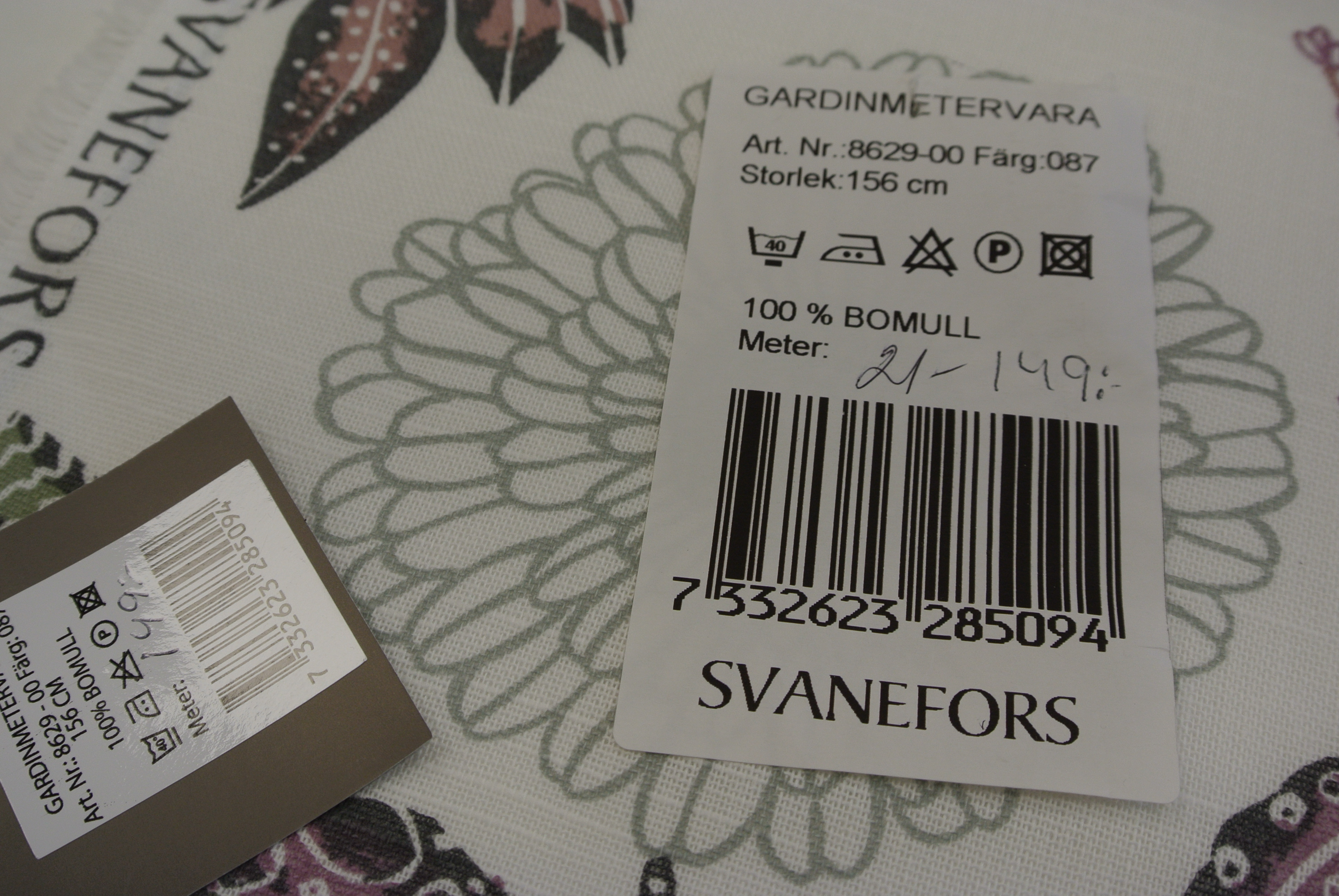 ljus botten med blommor i rosa,lila och grön mfl. - 3