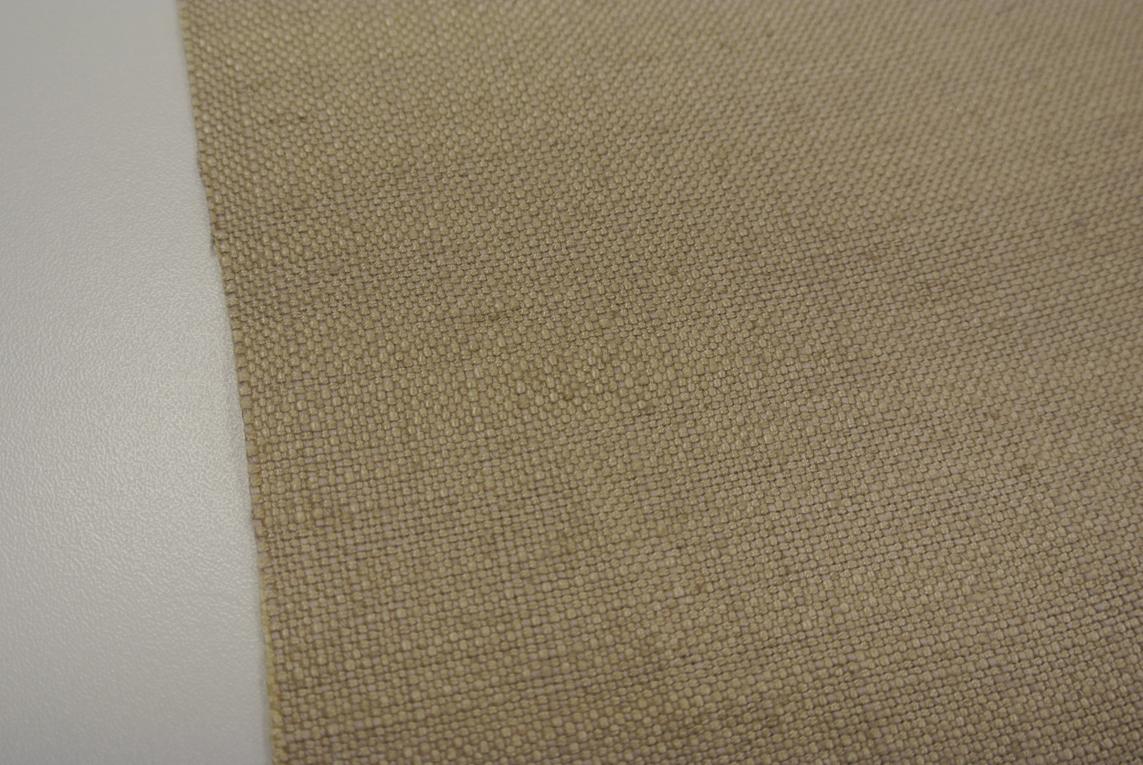 Beige Enfärgad lite grövre vävd