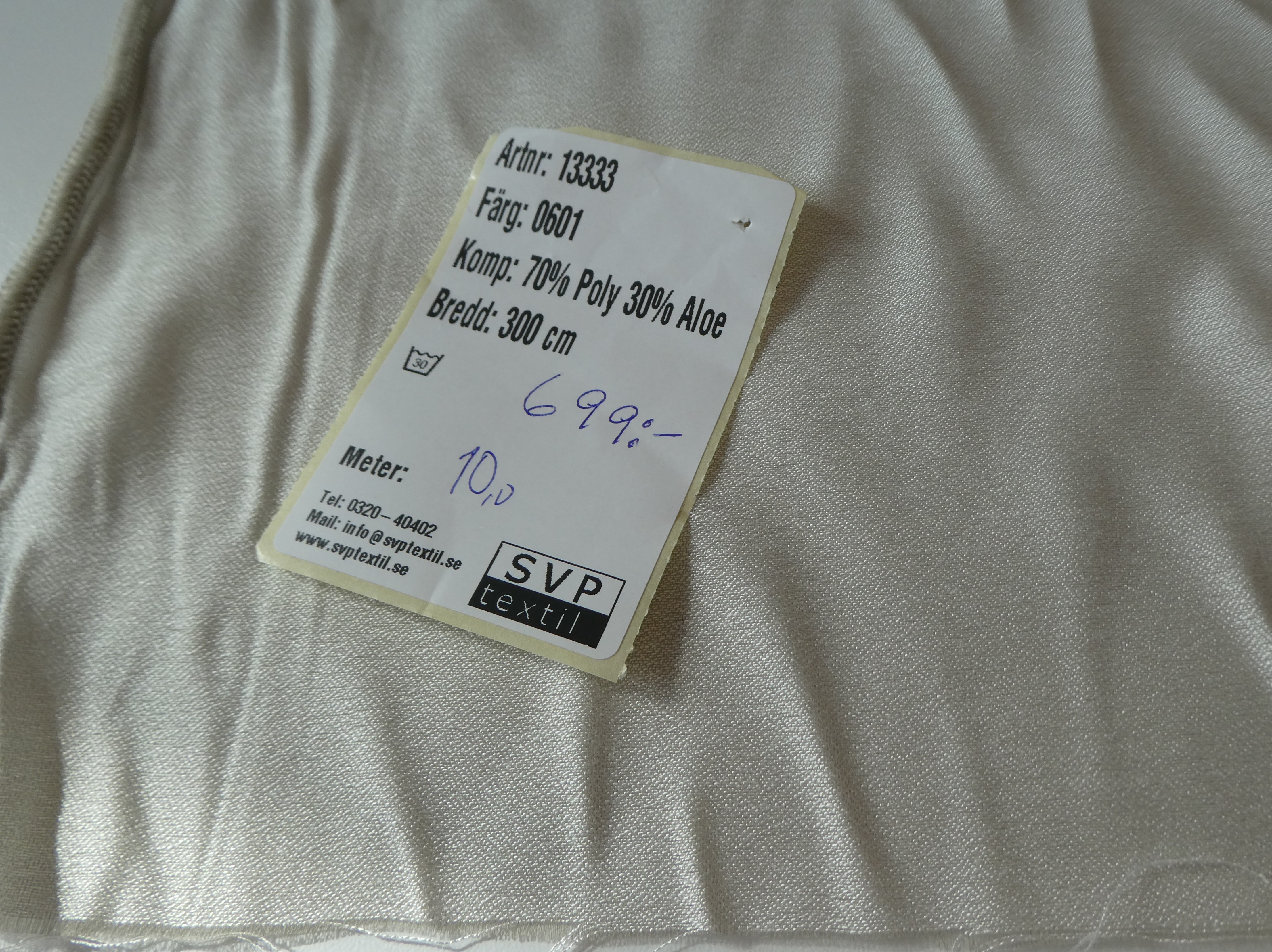 beige helt omönstrat tyg med Aloe - 2