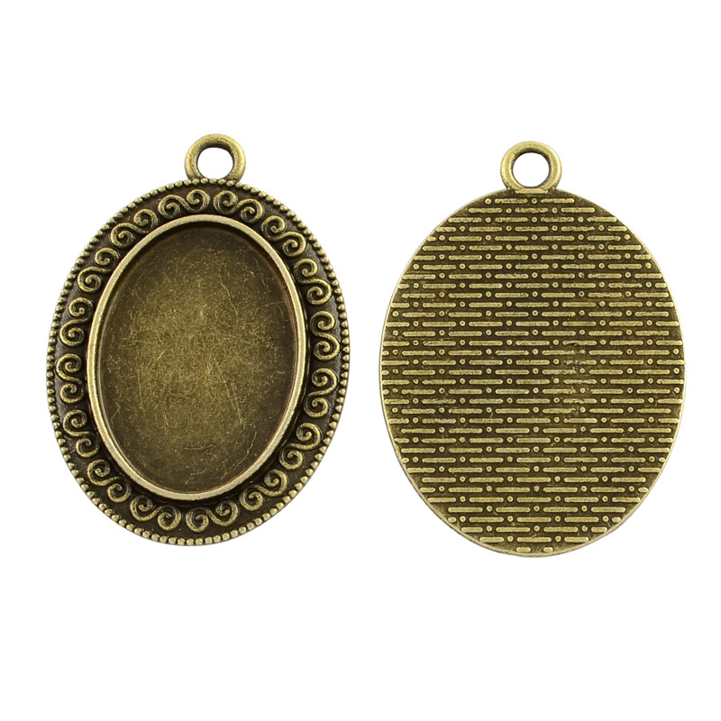 Cabochonfäste oval brons med kant 4st